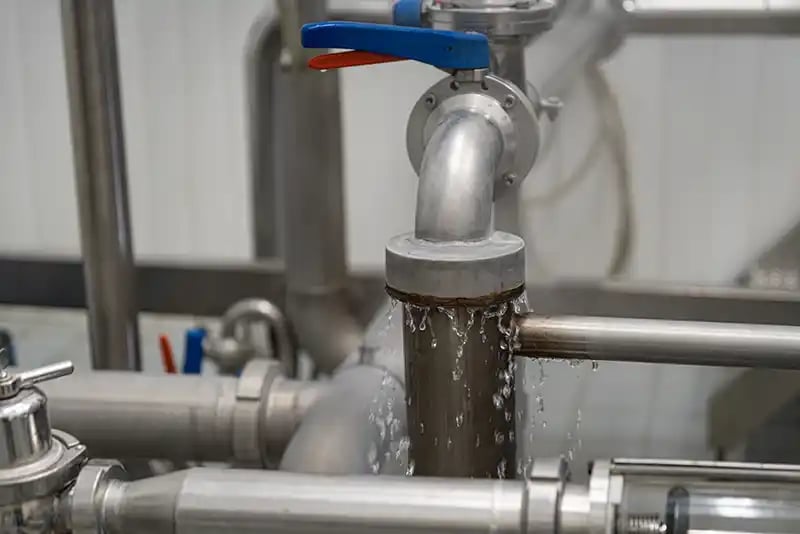 Water leaking from silver pipes