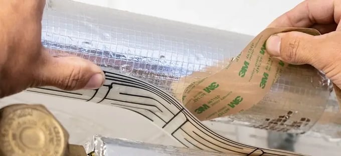 applying-adhesive-sensing-tape-800x367px